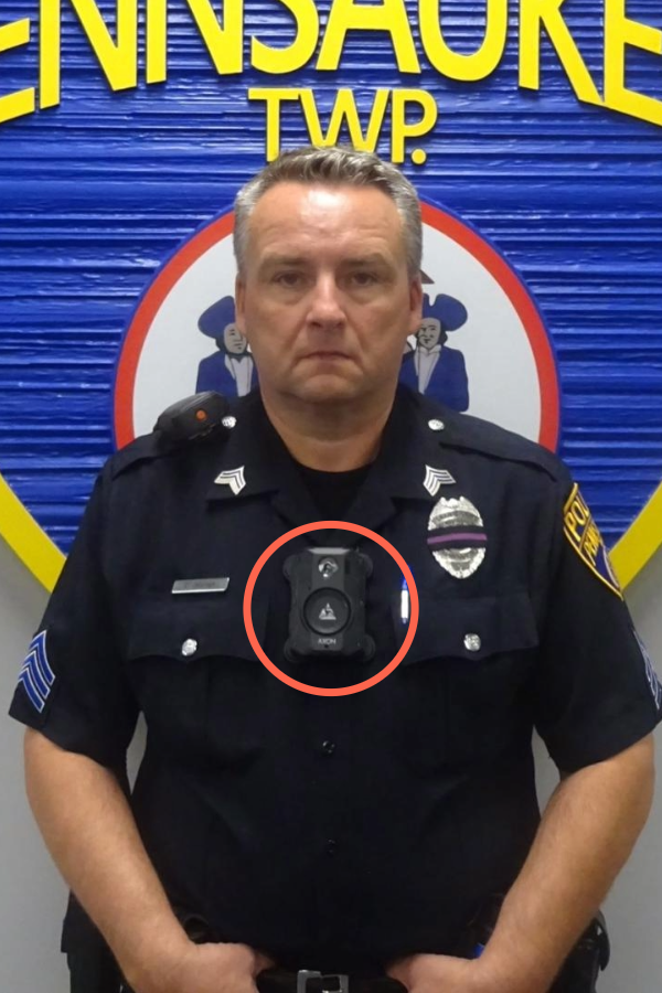 Camera attached to the uniform shirt placket.